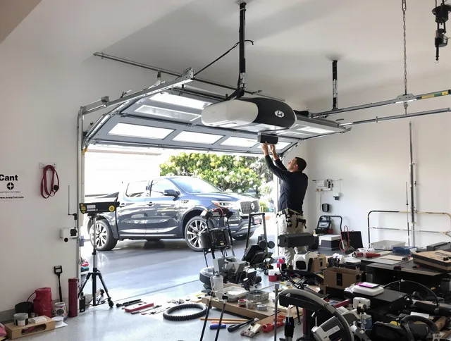 Burrillville Garage Door Repair specialist installing smart garage door opener system in Burrillville home