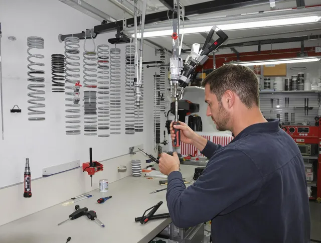 Burrillville Garage Door Repair safety certified technician performing precision spring replacement in Burrillville